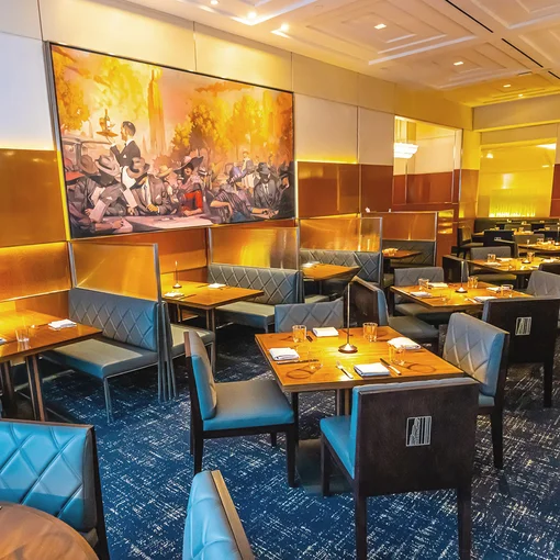 Elegant restaurant interior with artwork.
