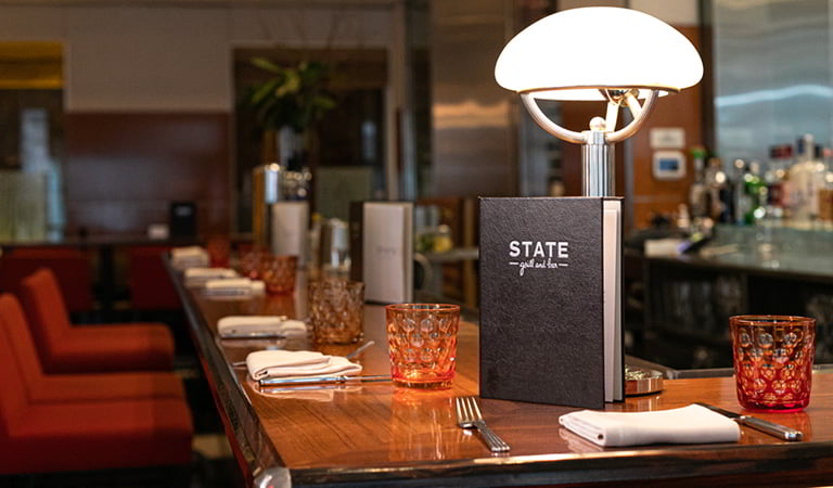 Bar and lounge space inside STATE grill and bar at the Empire State Building